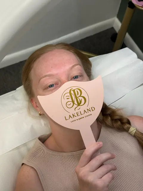 Before: the same client with her natural, untinted brows